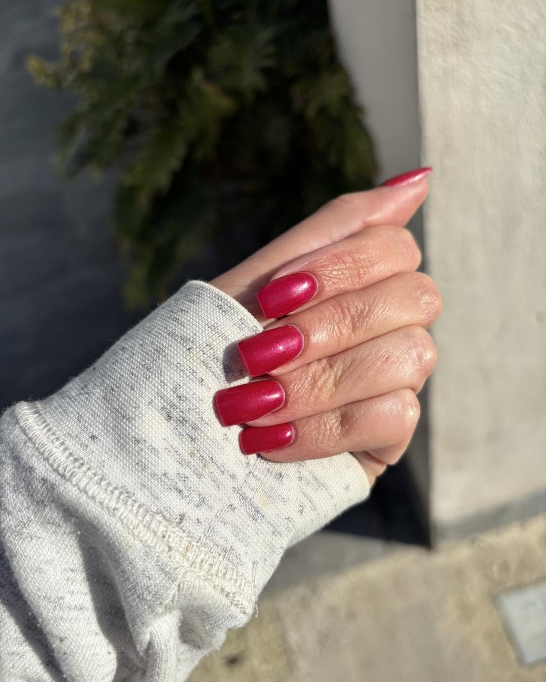 Glossy Crimson Finish manicure at dColorpallet Hair & Nails