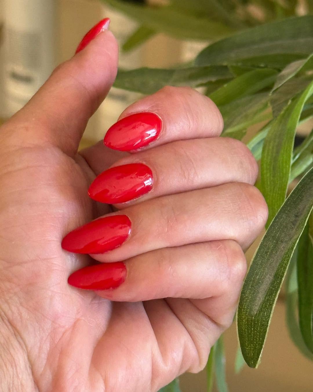 Vibrant Red Gel manicure at dColorpallet Hair & Nails